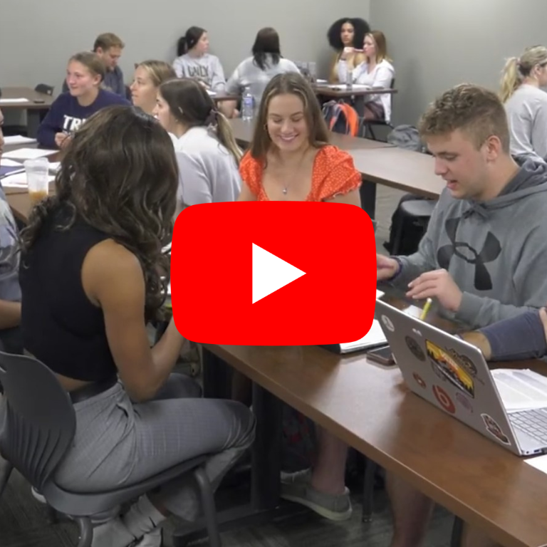 group of student collaborating in a classroom