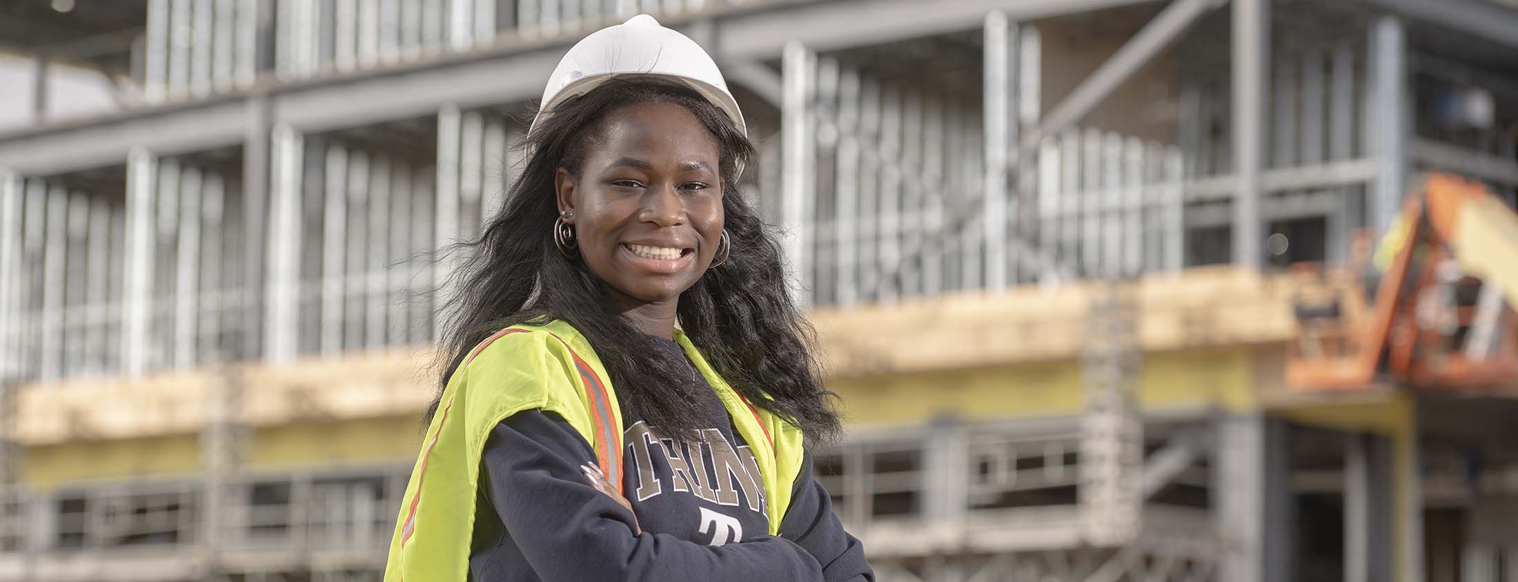 Student in front of construction site