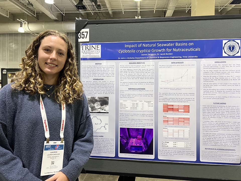 Trine University student presenting research poster