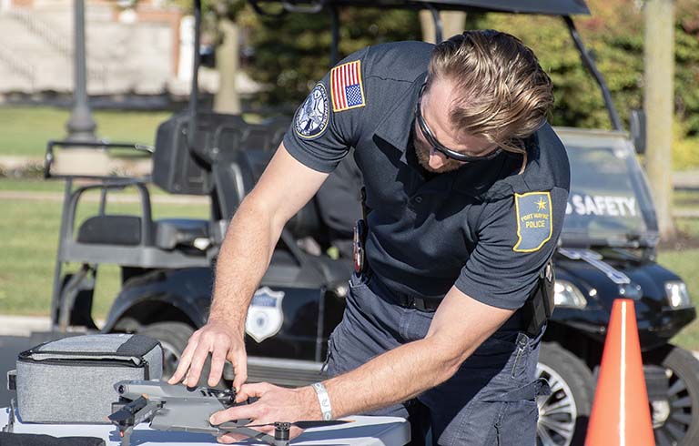Officer Michael Hickman preparing a drone