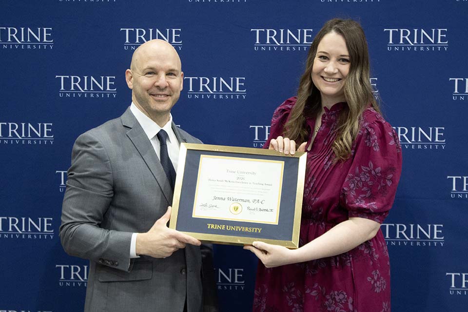 Dr. Kline presents award to Jenna Waterman