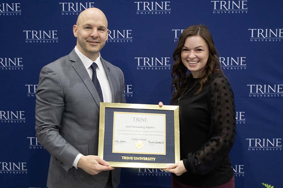 Dr. Kline presents award to Caitlyn Freese